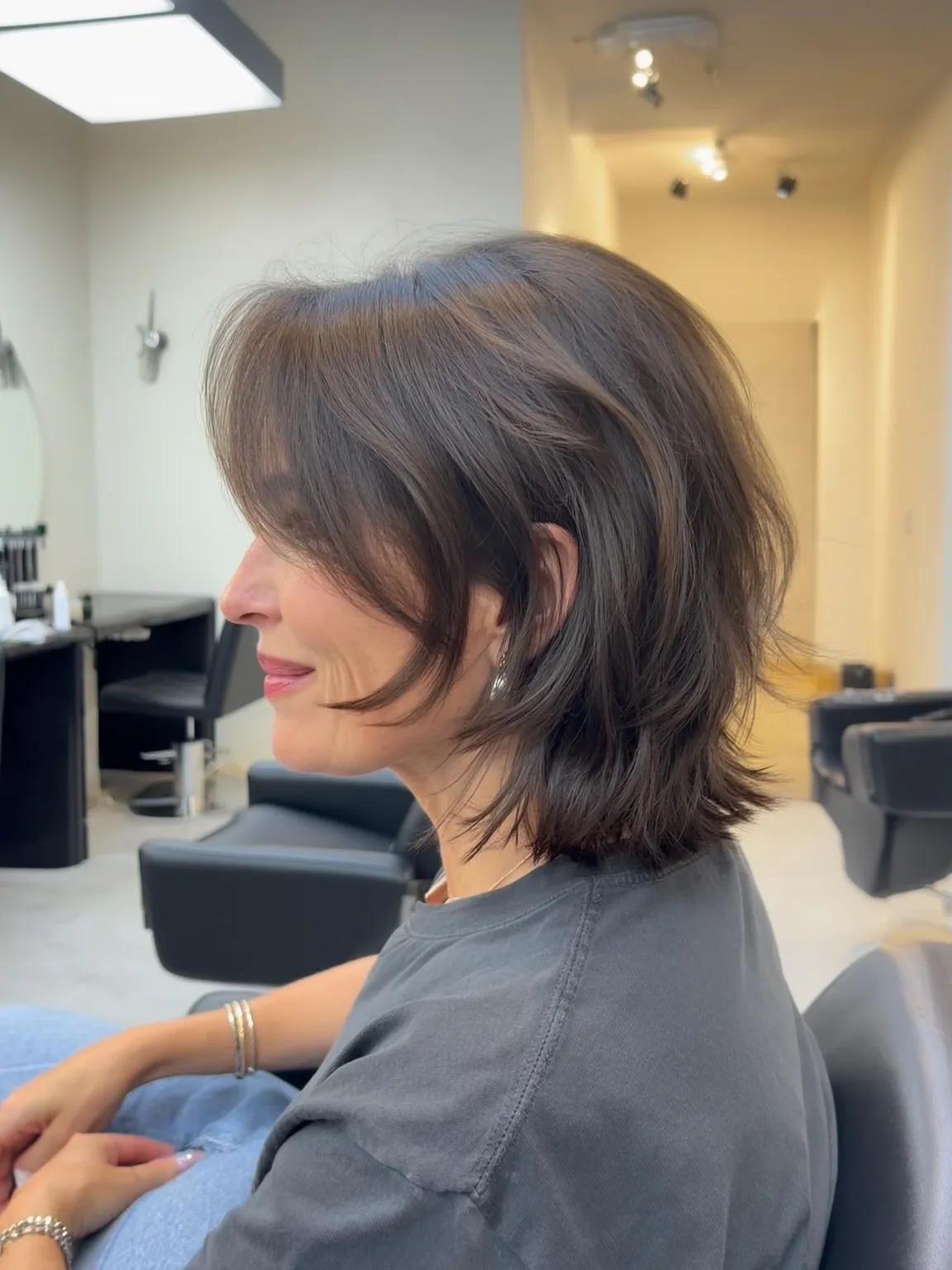 Wispy Side-Swept Bangs on Wavy Chocolate Brown Bob